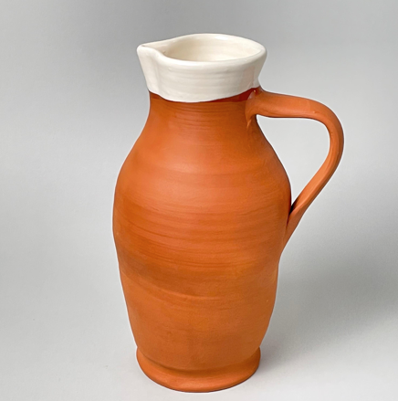 White Rimmed Terra Cotta Pitcher